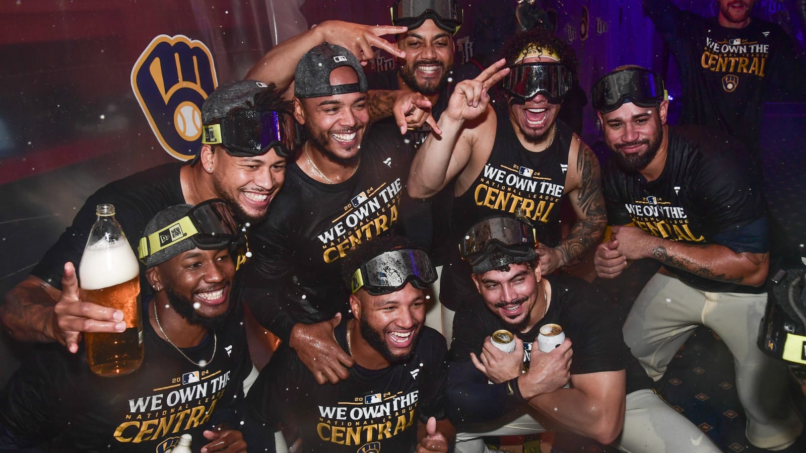 Crowned NL Central champs earlier in day, Brewers nip Phillies