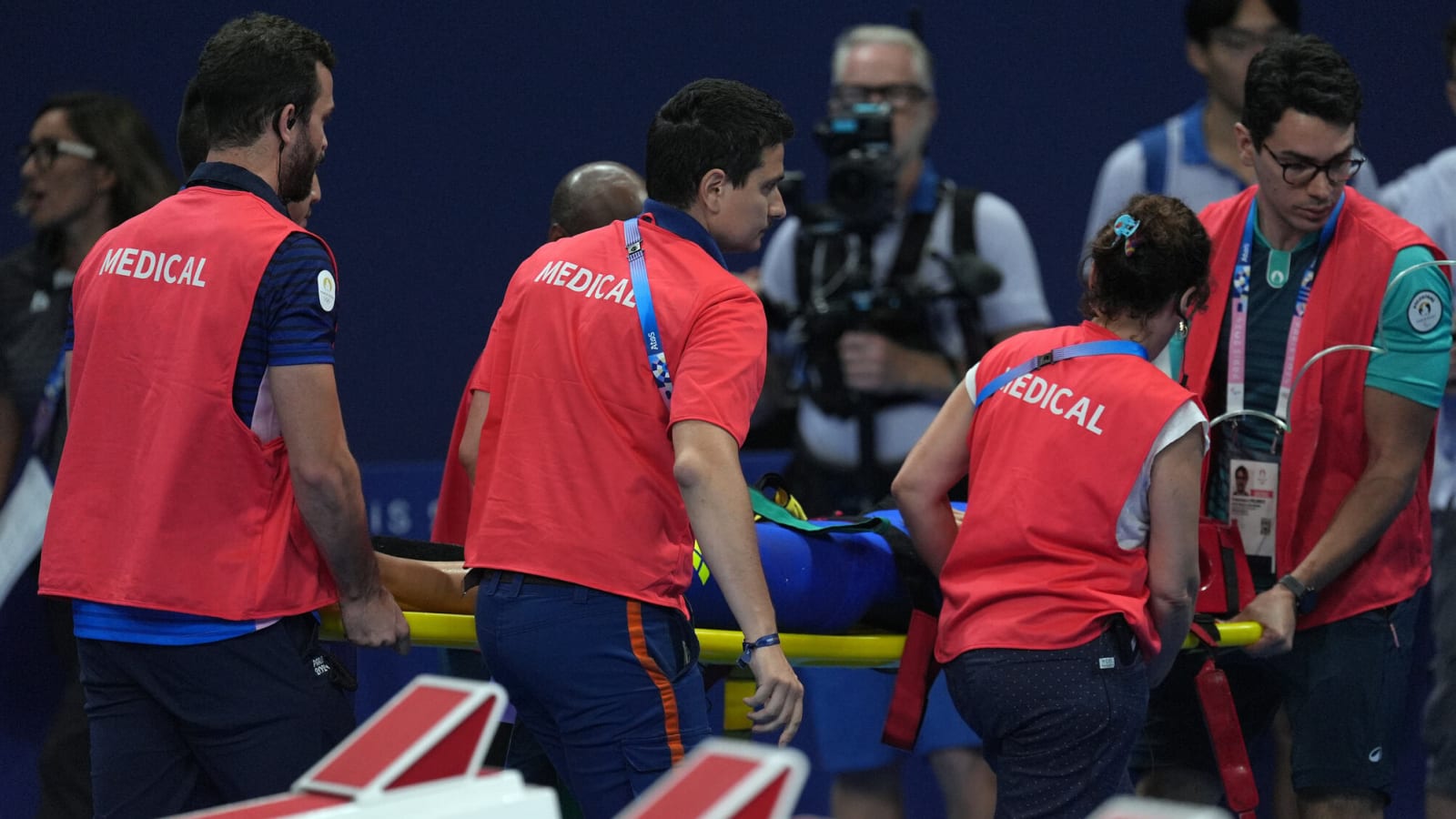 Olympic swimmer collapses poolside due to asthma attack