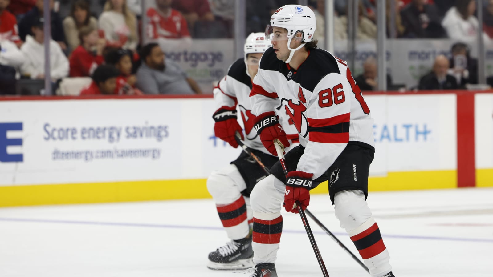 Jack Hughes pulverized by Michael Rasmussen while trying to stop empty-net goal (video)