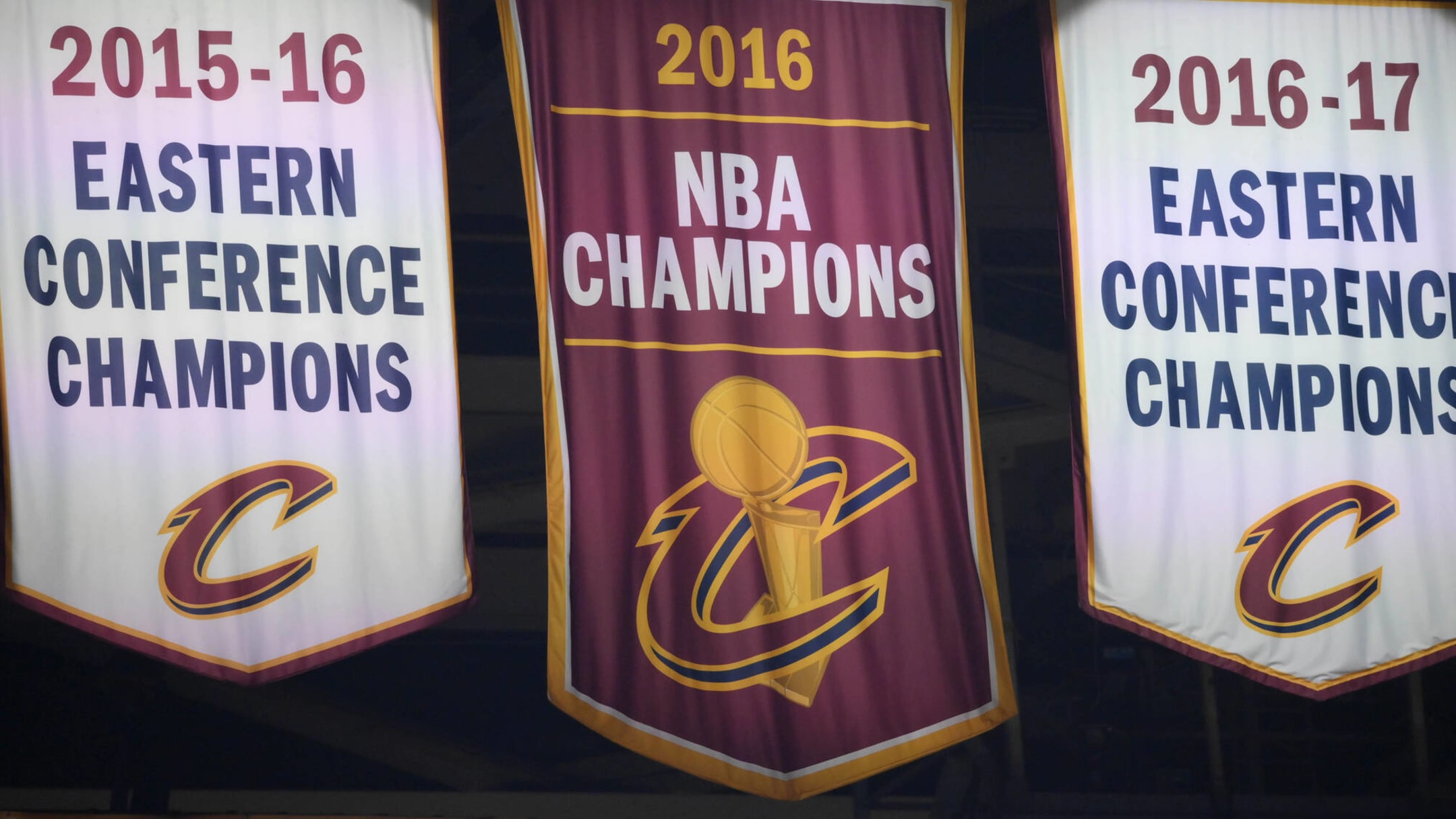 New Cavs logos emphasize gold and wine colors, drops navy