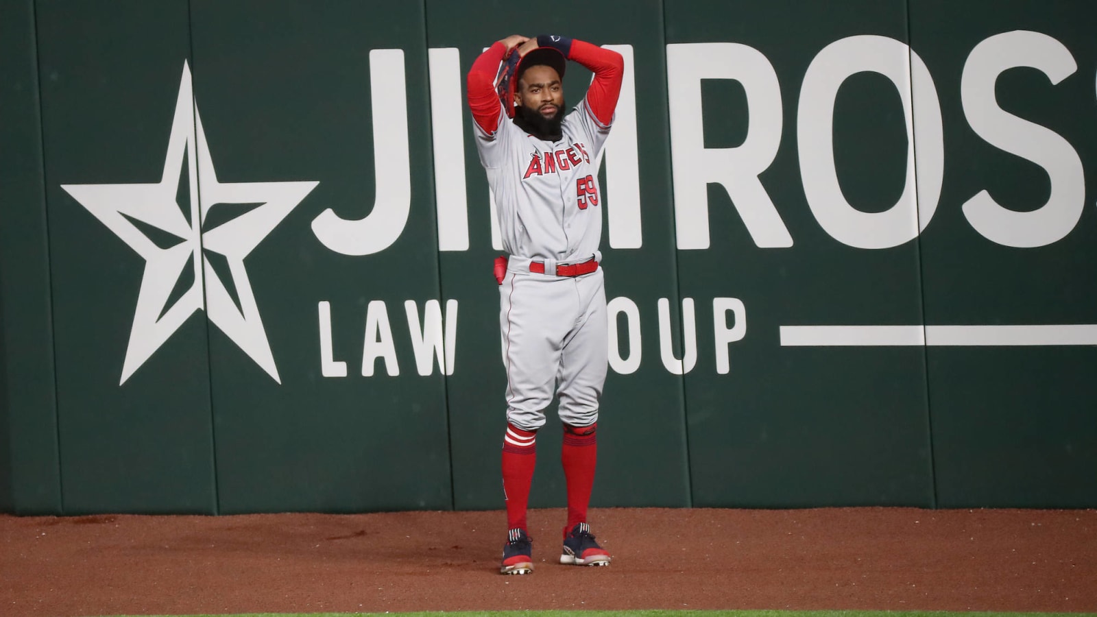 Jo Adell accidentally knocks routine fly ball over fence