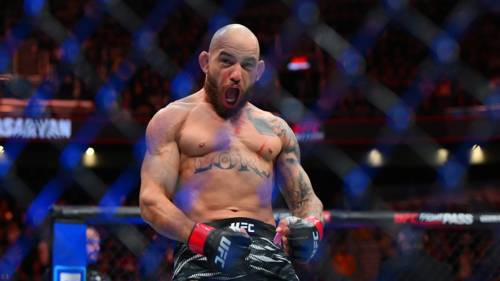 UFC star fights back tears while being introduced by MMA legend Bruce Buffer