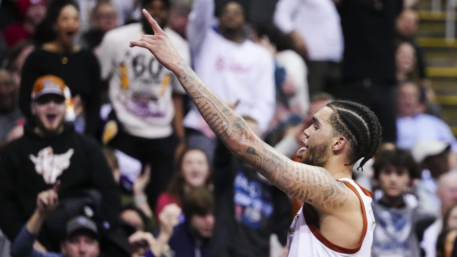 Watch: Texas forward makes halfcourt first-half buzzer-beater