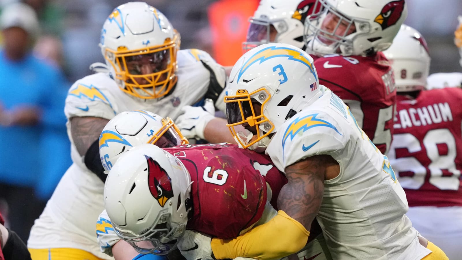 Derwin James Jr. #3 of the Los Angeles Chargers forces a fumble