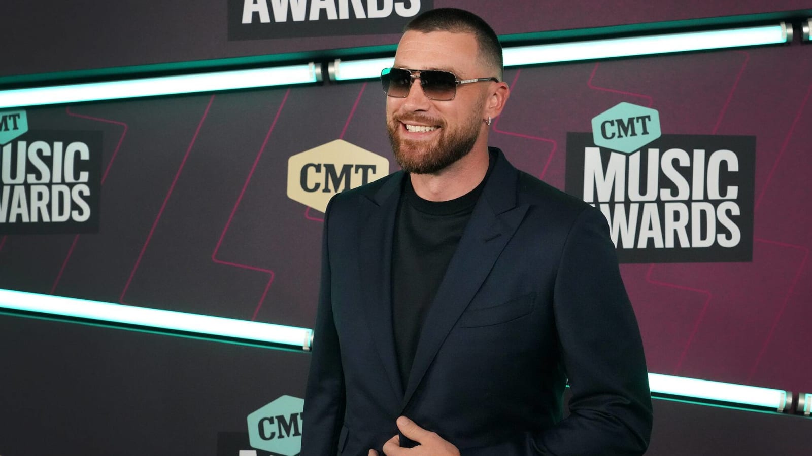 Travis Kelce defends hilarious Ed Kelce move at latest Eras Tour show after being caught filming Taylor Swift with flash on