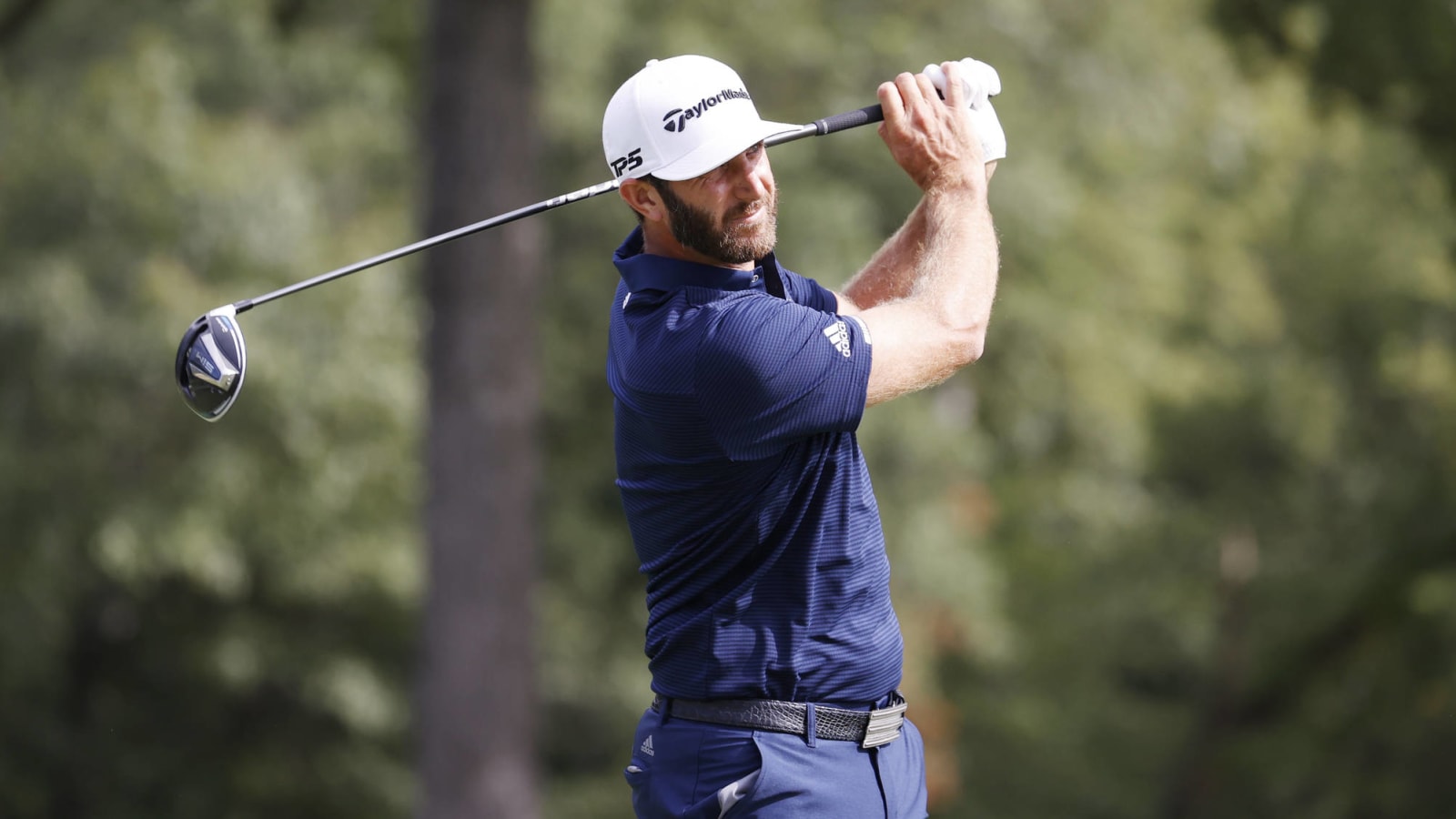 Dustin Johnson forces playoff with Jon Rahm with huge putt