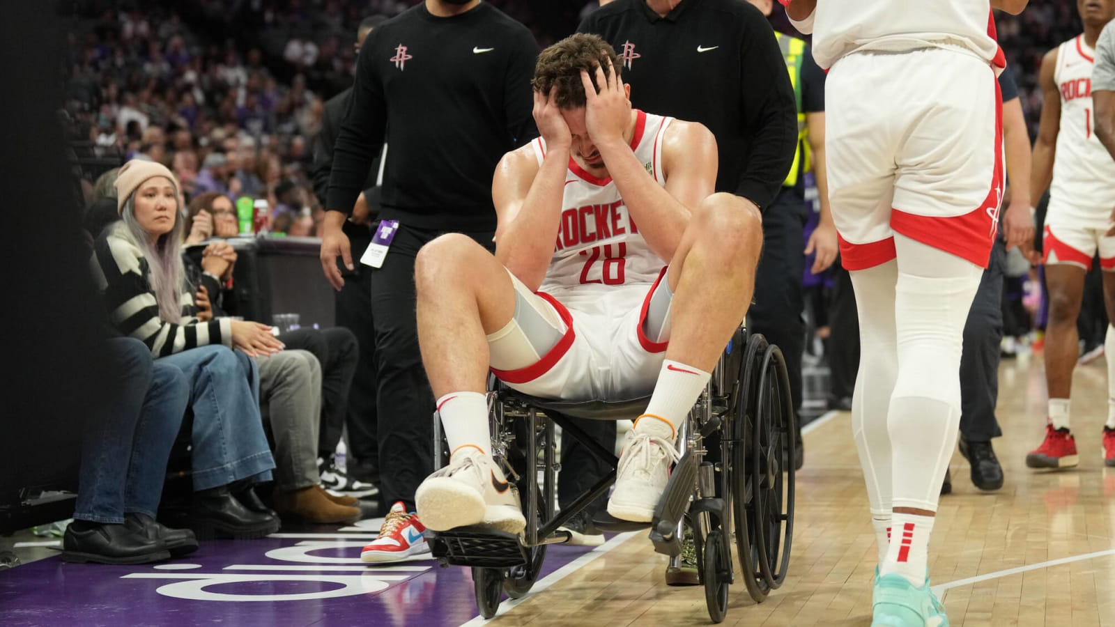 Watch: Rockets center needs wheelchair after scary fall