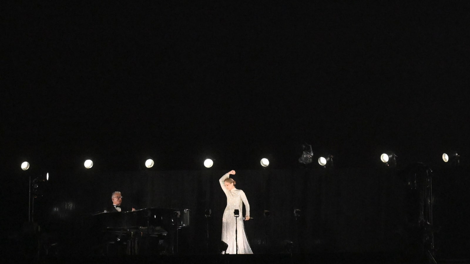 Celine Dion responds to Lewis Hamilton’s wholesome message after Olympics opening ceremony performance