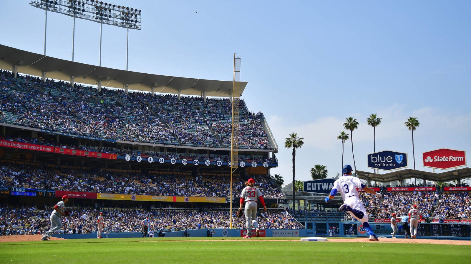 Dodgers fan catches foul ball with baby strapped to his chest, doesn’t spill a drop of beer