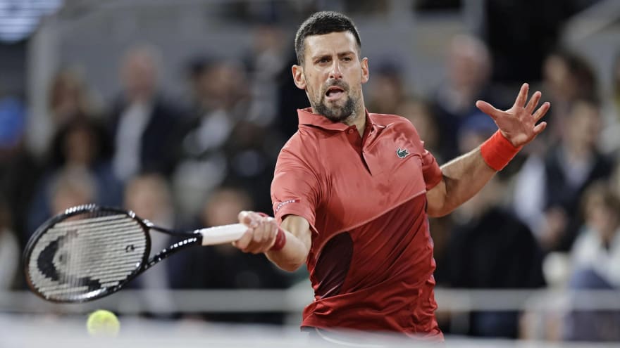Watch: Novak Djokovic booed by Roland Garros crowd after falling on court during his first-round match against Pierre-Hugues Herbert