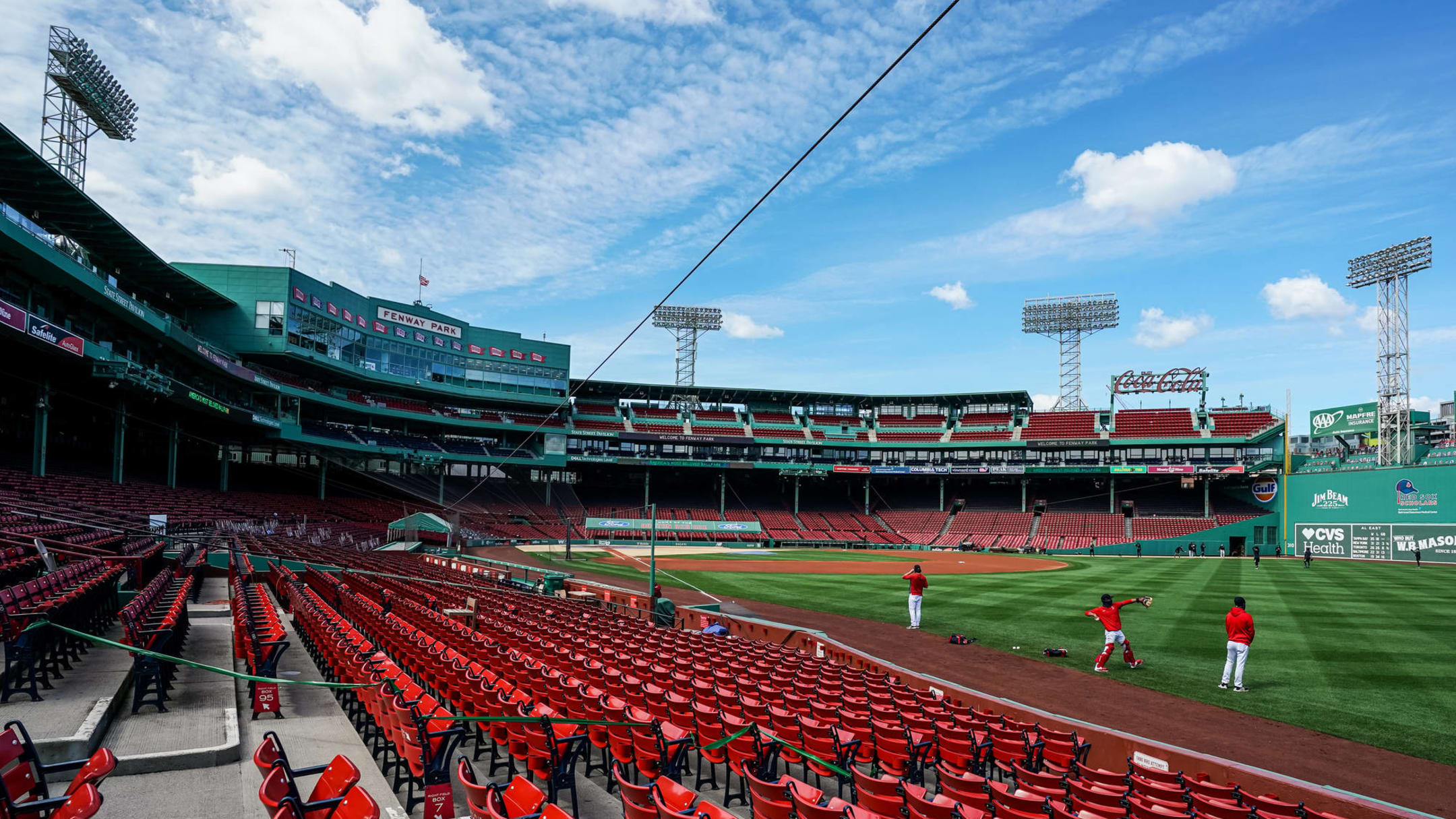 Red Sox fans take advantage of flooded Fenway Park during rain