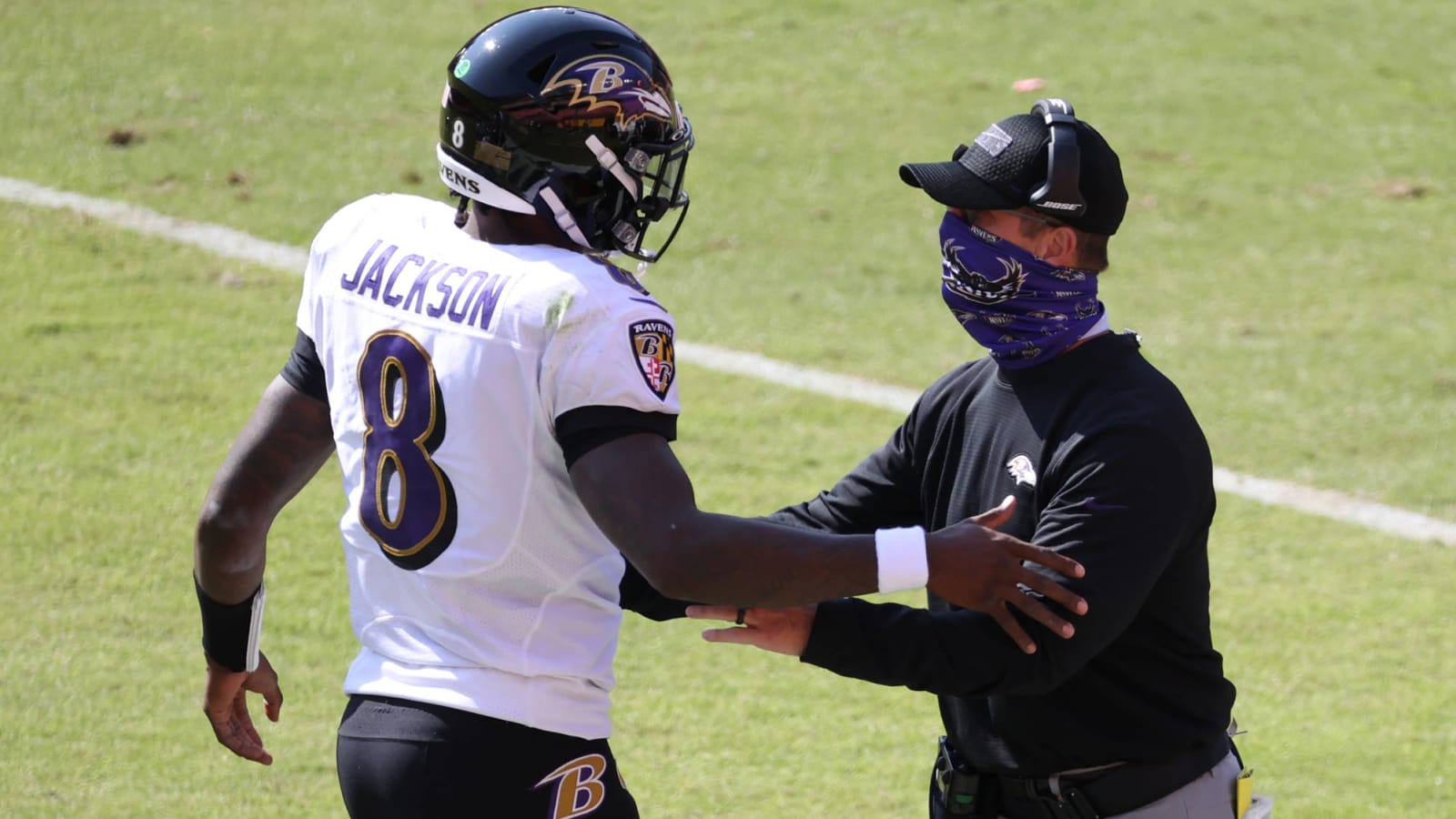 Harbaugh guarantees Ravens will pick up Jackson's option