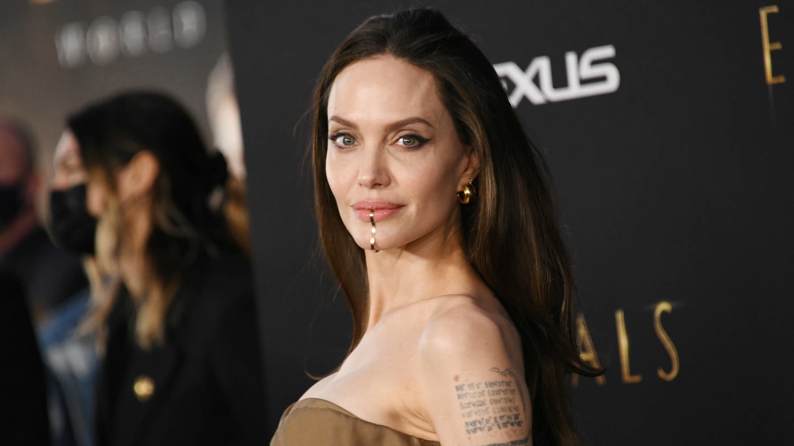 Angelina Jolie doesn't enjoy parent-teacher conferences: 'I have a problem with schools'