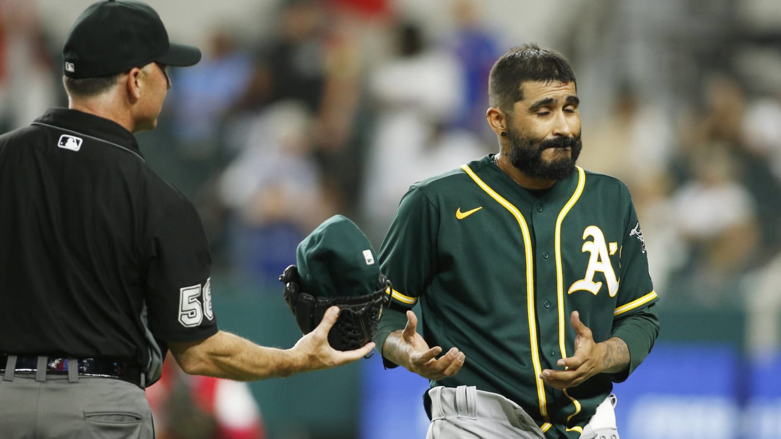 A's reliever Sergio Romo drops pants during substance check