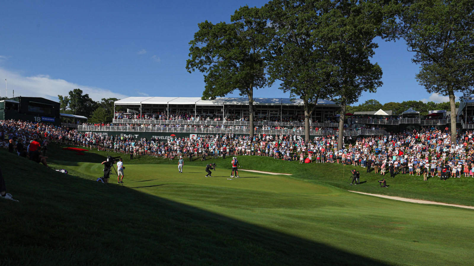 Watch: Protesters storm 18th green at Travelers Championship