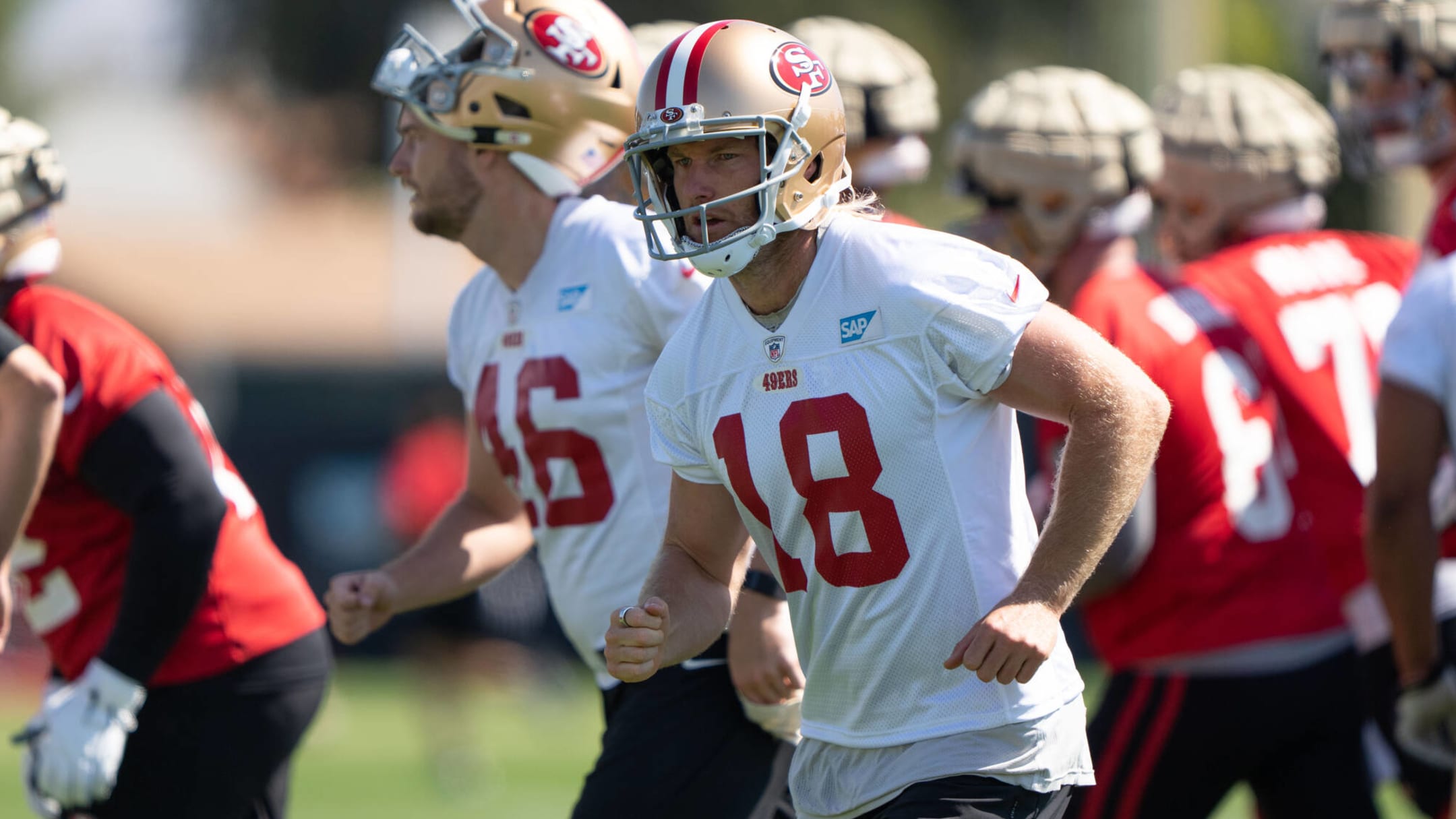 San Francisco 49ers Mitch Wishnowsky (18) punts during an NFL