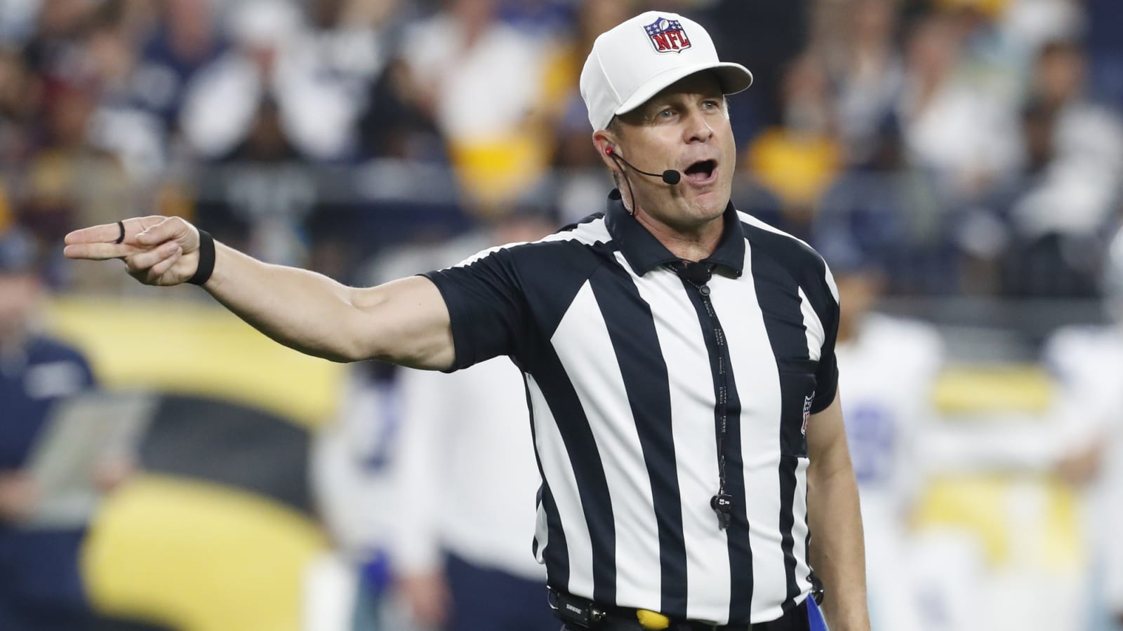 NFL referee honors father, calls penalty in German