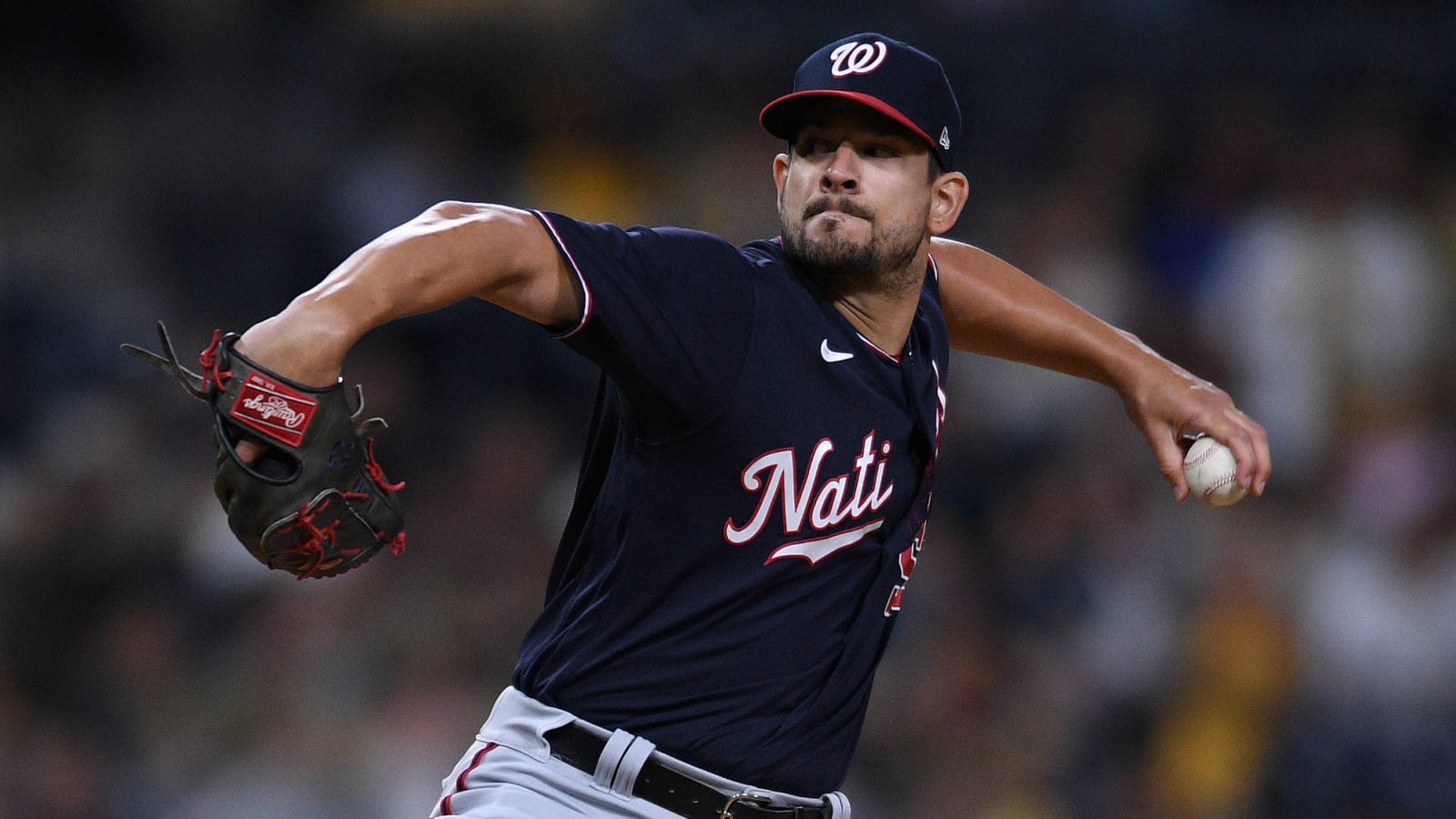 San Diego Padres relief pitcher Brad Hand reacts to walking