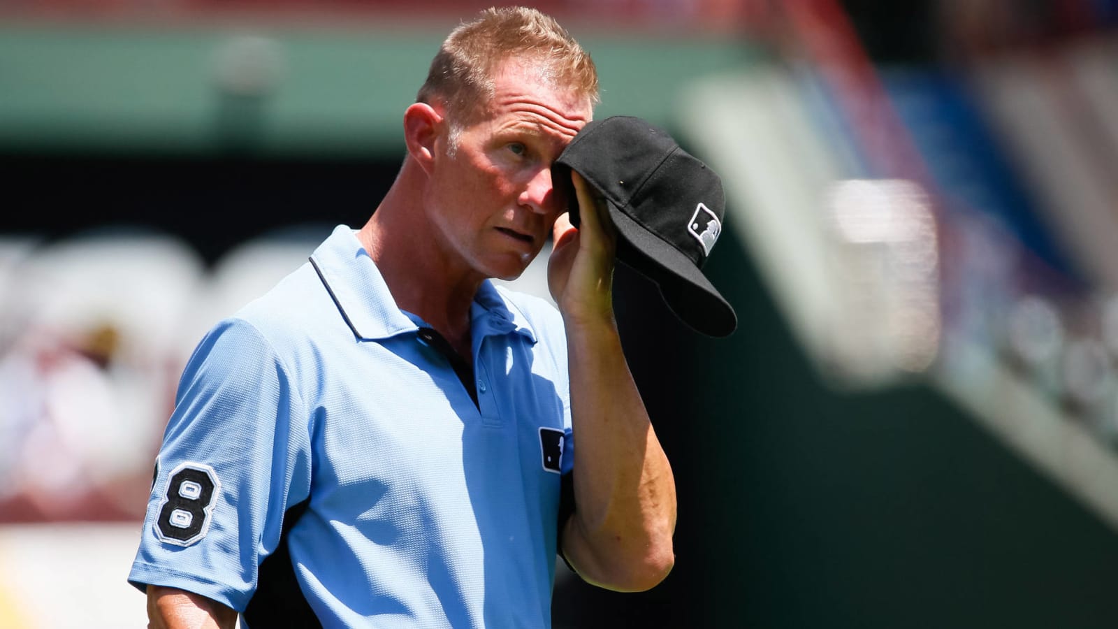 MLB ump Jim Wolf’s jacked arms compare to Ed Hochuli's