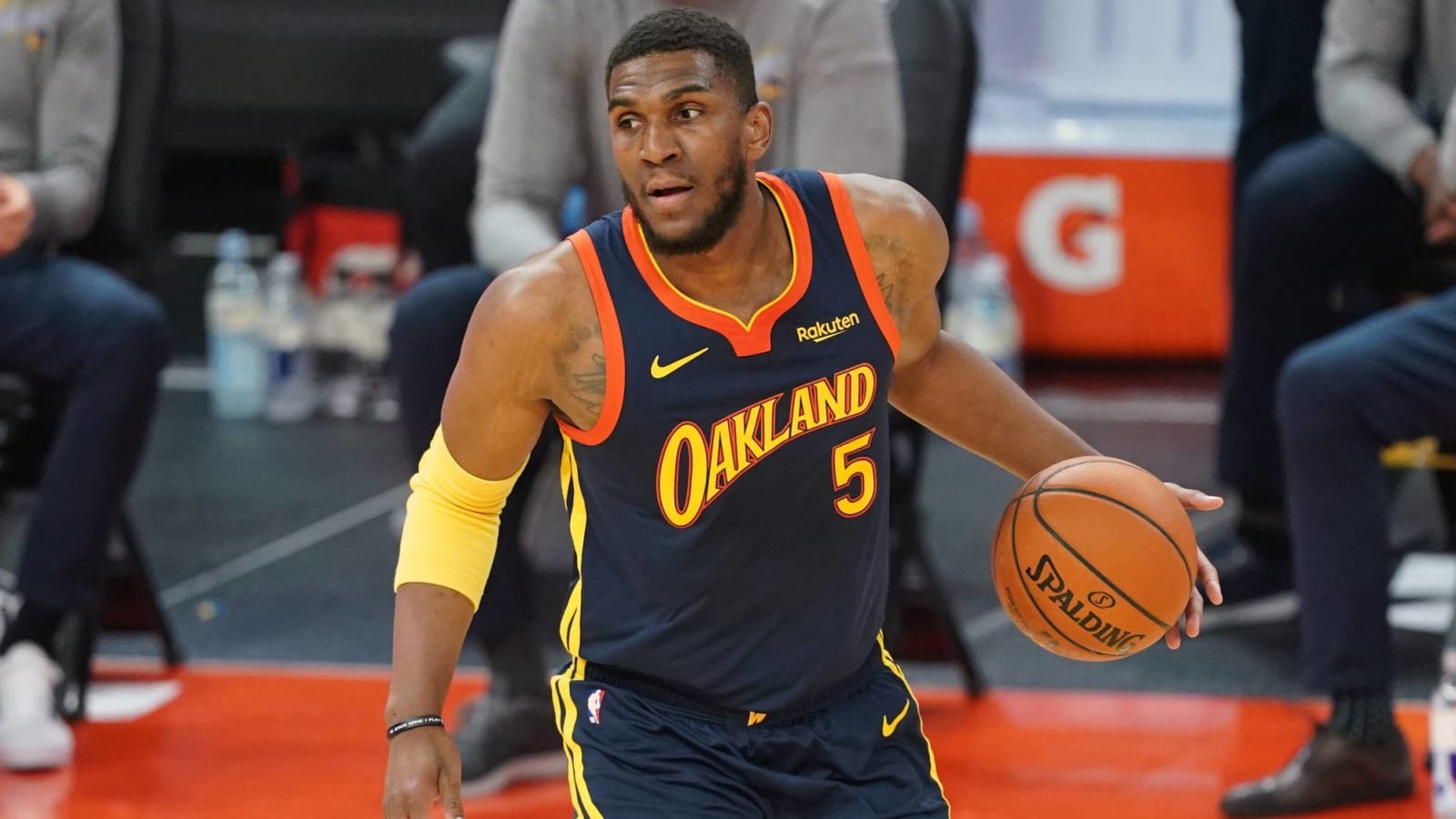Kevon Looney exercising $5.1M option