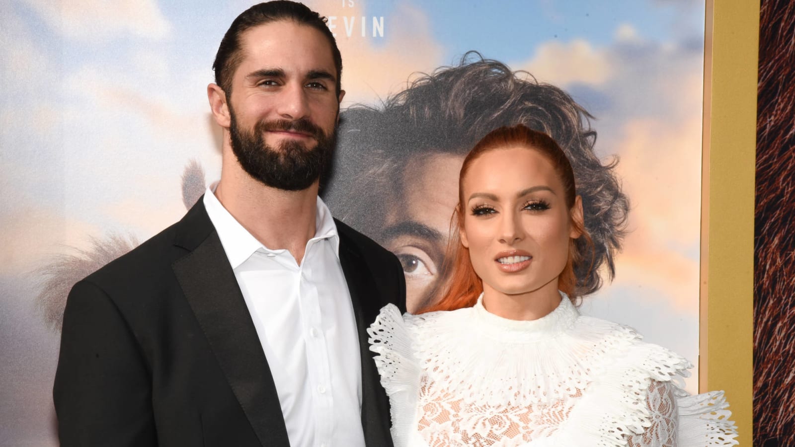 Becky Lynch and Seth Rollins' wedding day picture with their baby