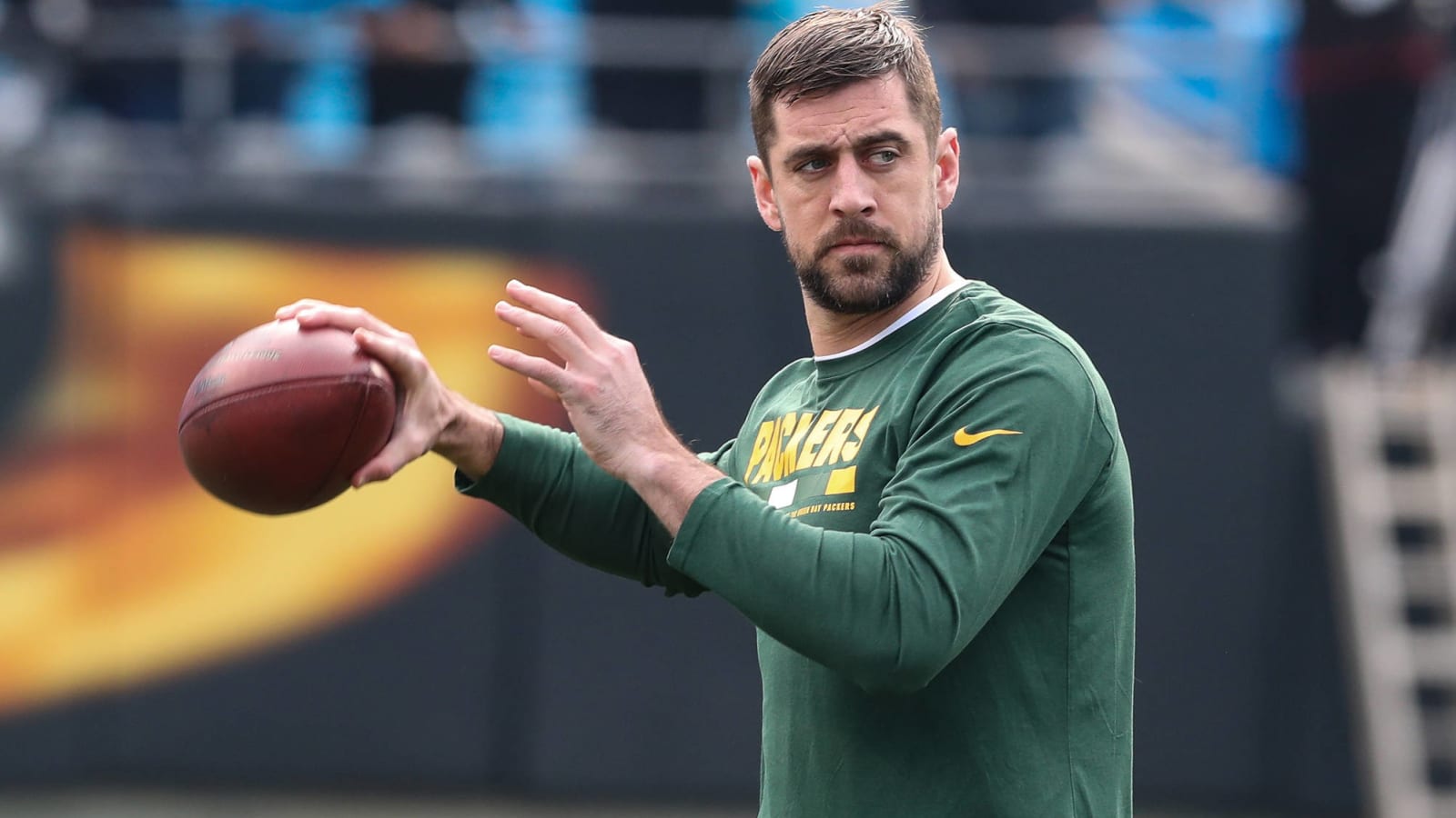 Watch: Aaron Rodgers throws pass to fan jumping off boat