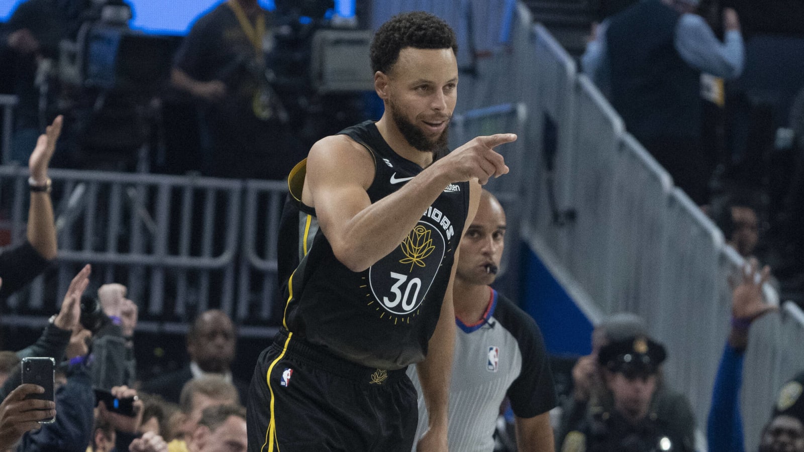 Watch: Steph Curry drills shot from beyond half-court, but it didn't count