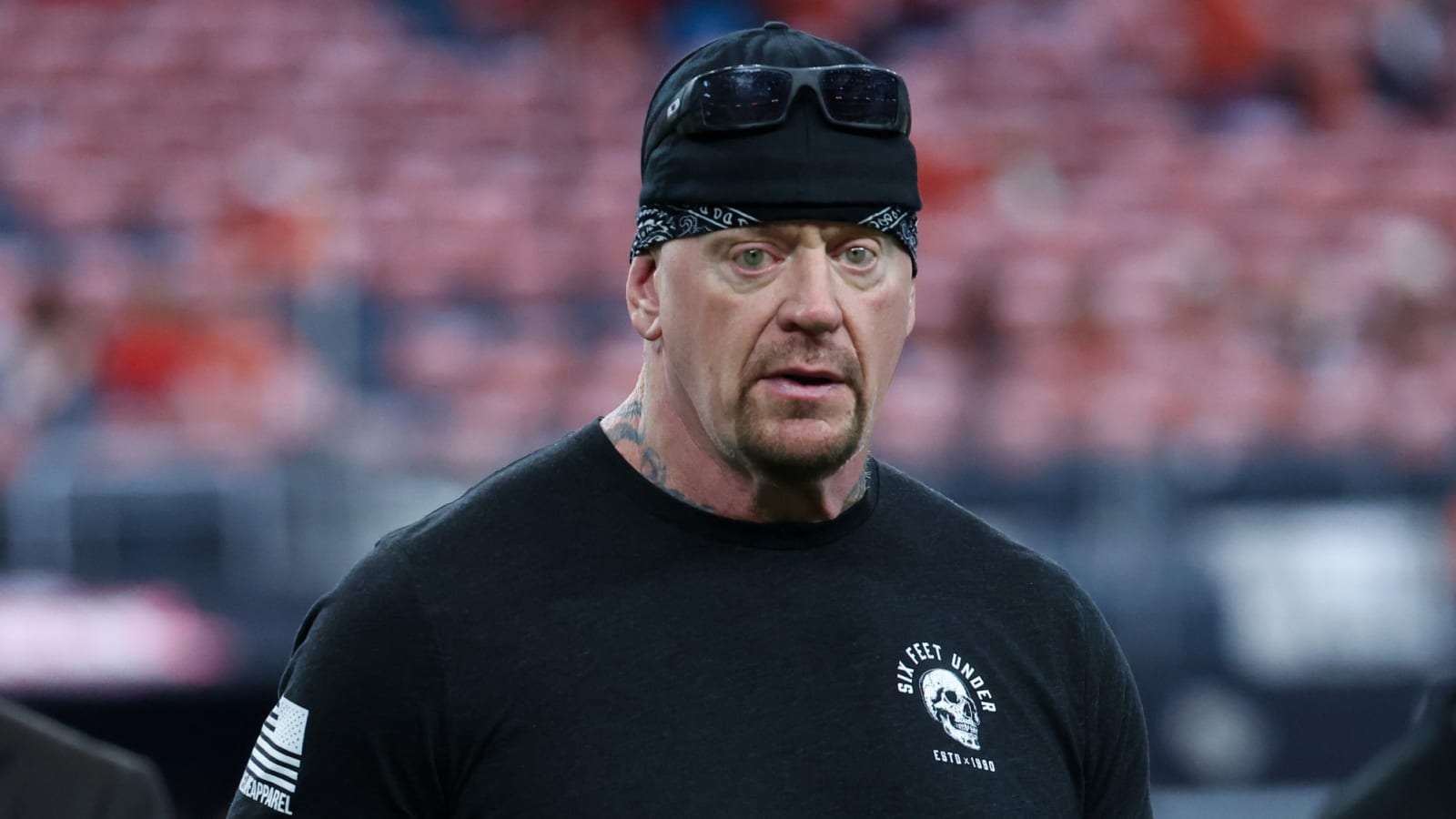 Watch: The Undertaker goes off on legendary boxer Evander Holyfield’s son for wearing jewelry during WWE match
