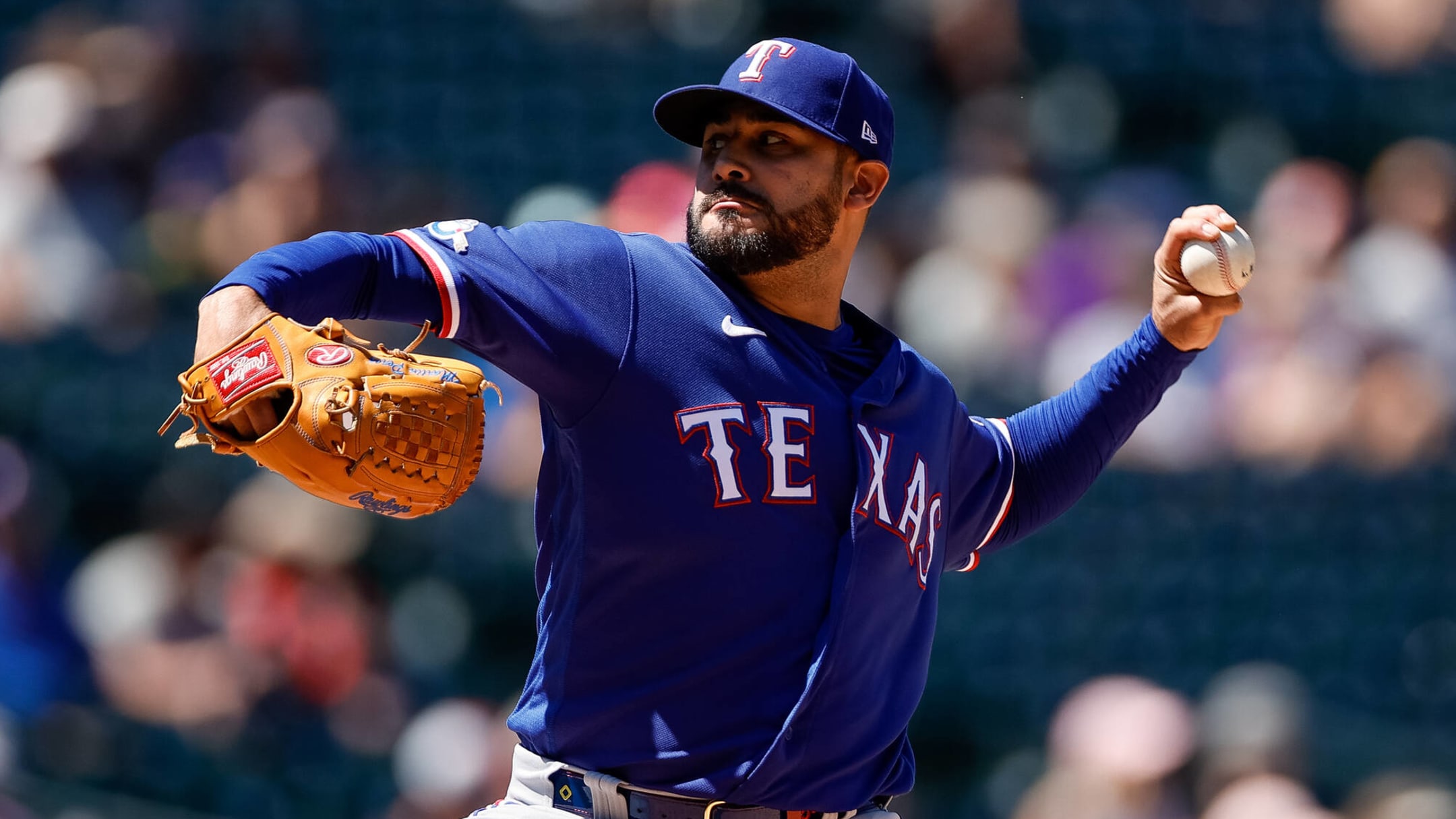 Texas Rangers starting pitcher Martin Perez throws during the