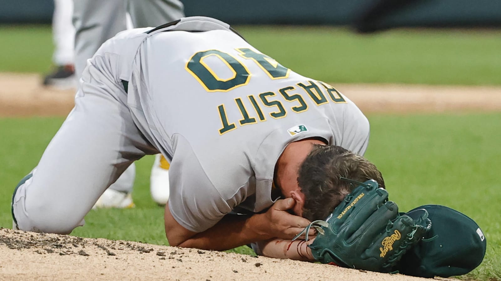 A's Bassitt carted off field after being struck by liner