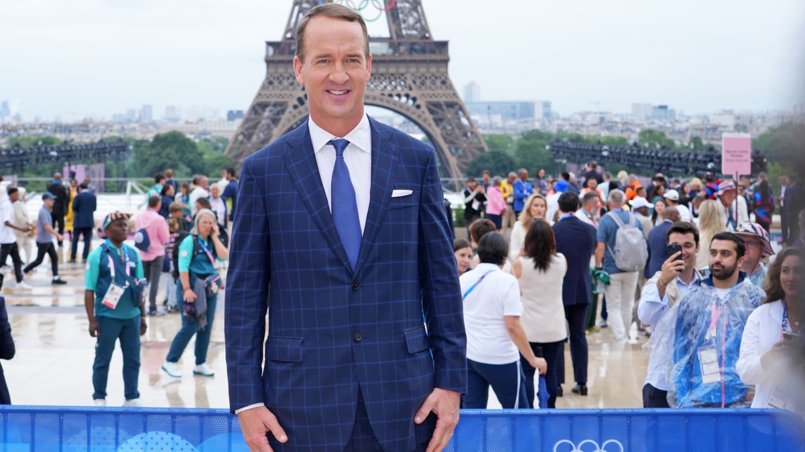 Peyton Manning hilariously uses playcall wristband while being a guest co-host at the Paris Olympics Opening Ceremony