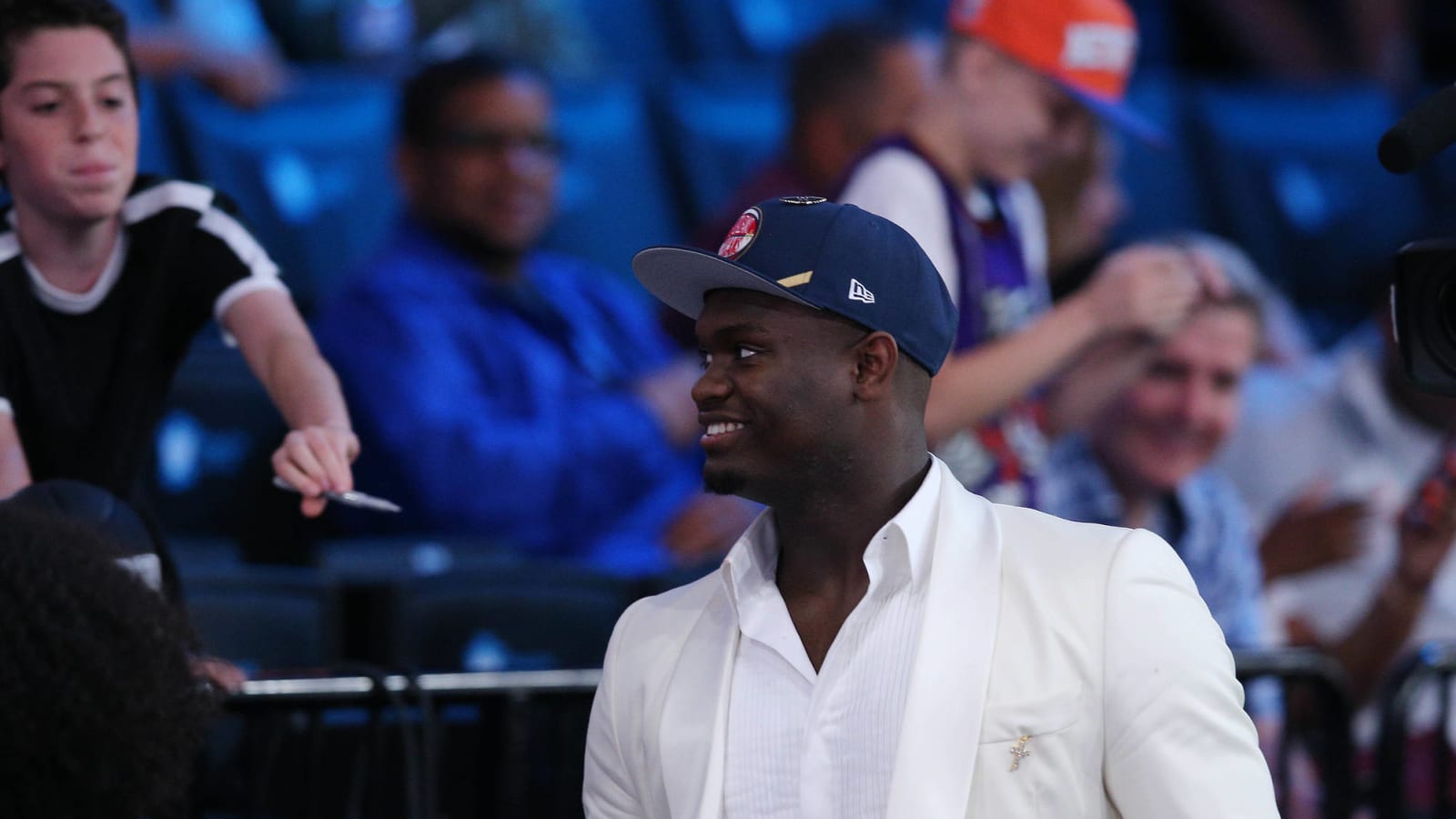 Watch: Zion Williamson trades autographed shoes with young Pelicans fan