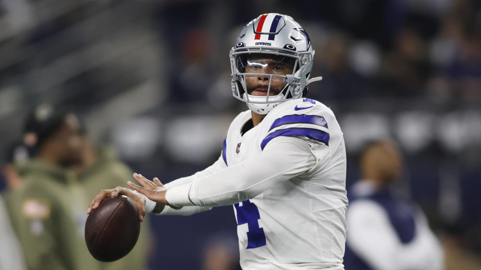 Why the Cowboys are rocking red stripes on their helmets