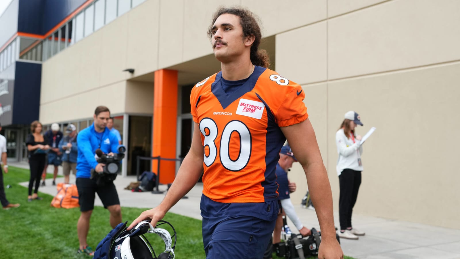 Greg Dulcich's hair and play impressing Broncos