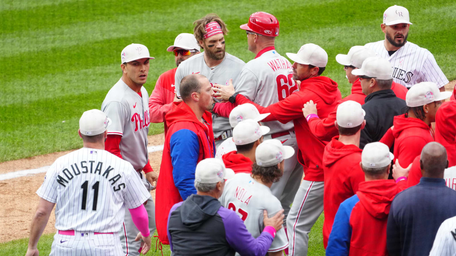 Watch: Phillies' Bryce Harper ejected for charging Rockies dugout as benches clear