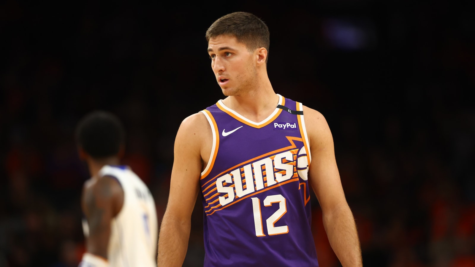 Suns guard fractures right ankle