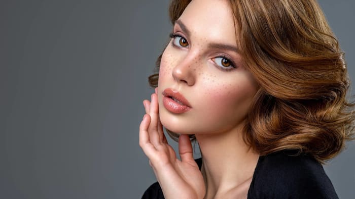 Use liquid eyeliner for subtle freckles