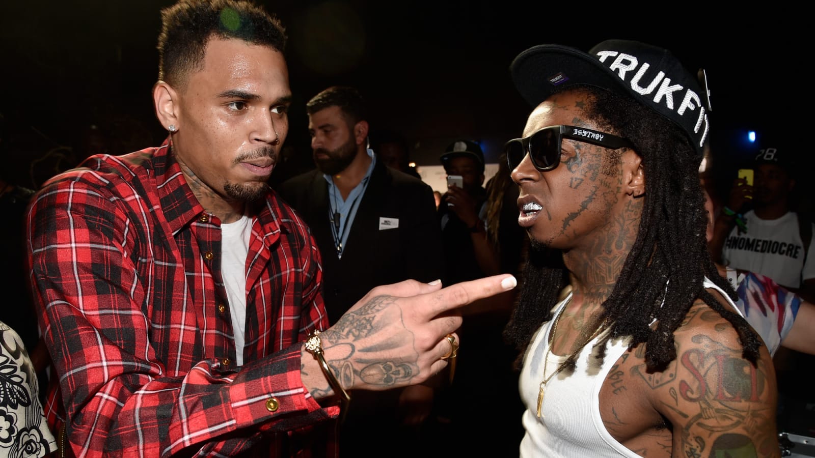 Lil Wayne, Chris Brown, and More Used Millions in COVID-19 Relief on Private Jets, Balenciaga and Gucci