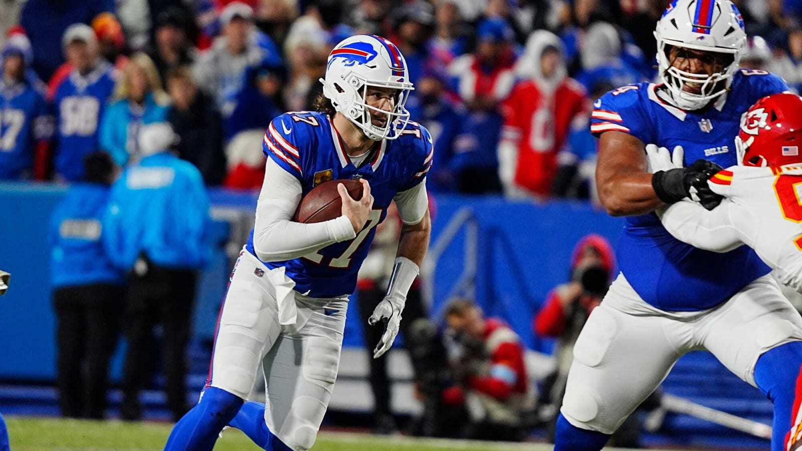 O'Cyrus Torrence blocks as Josh Allen prepares to run vs. Chiefs in Orchard Park
