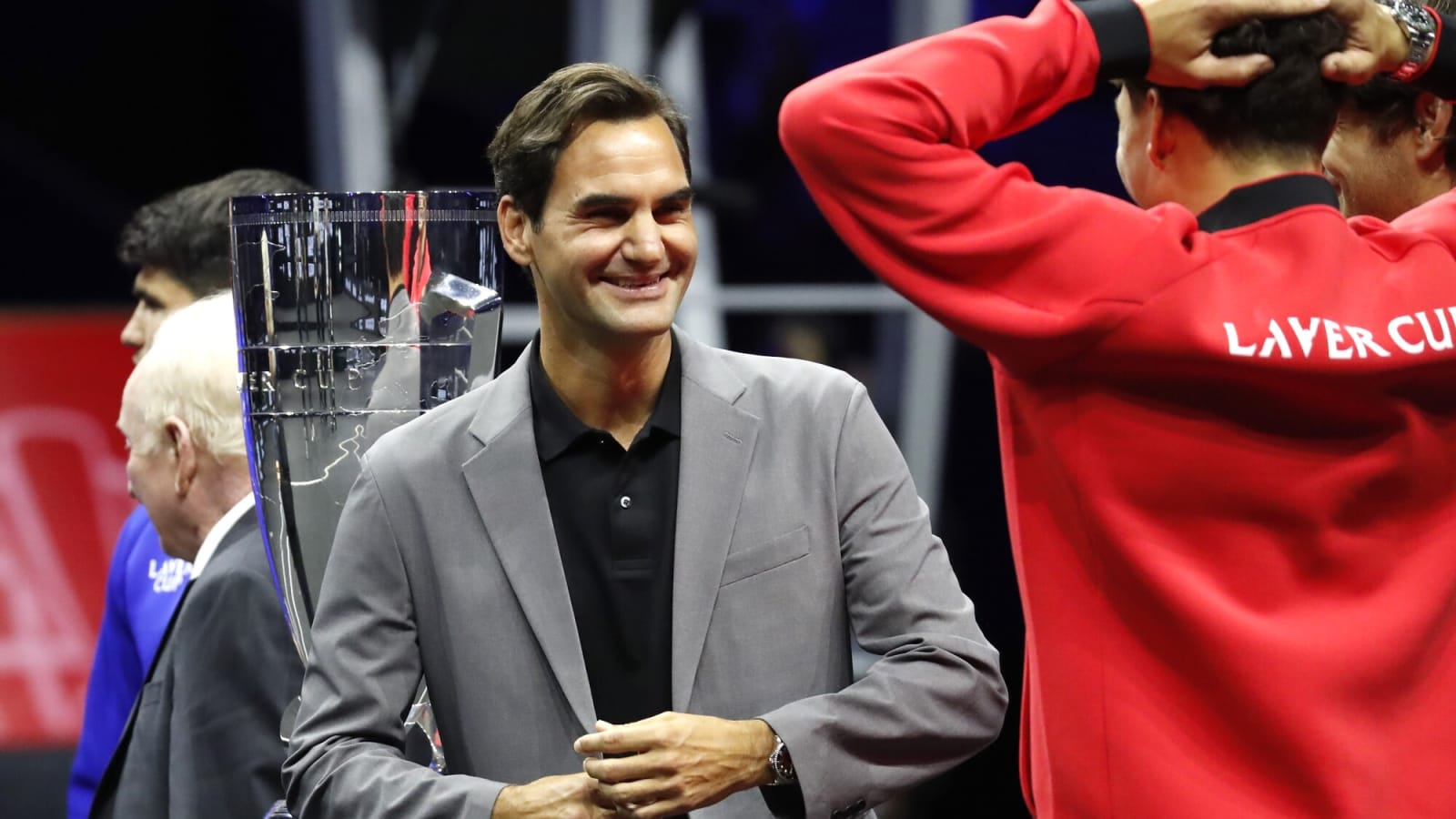 Roger Federer presents John McEnroe and Bjorn Borg with personalized Rolex watches in their final Laver Cup events as captains