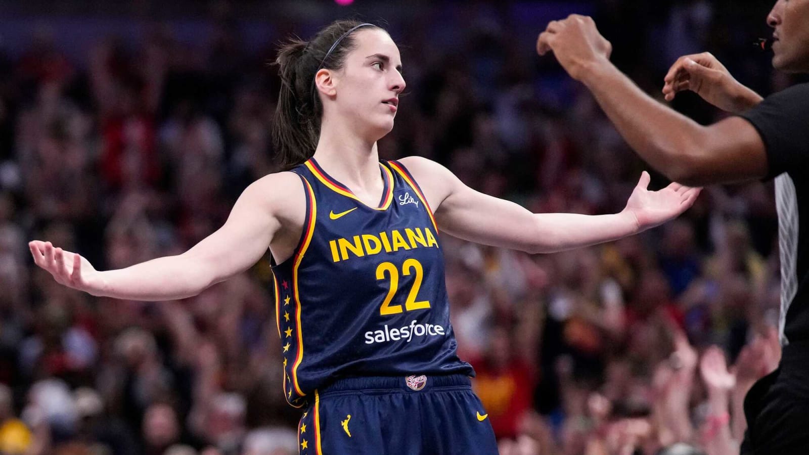 Fever guard Caitlin Clark celebrates three-pointer at Gainbridge Fieldhouse
