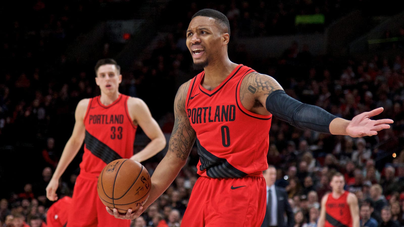 Damian Lillard talks with security over mother’s incident with fan