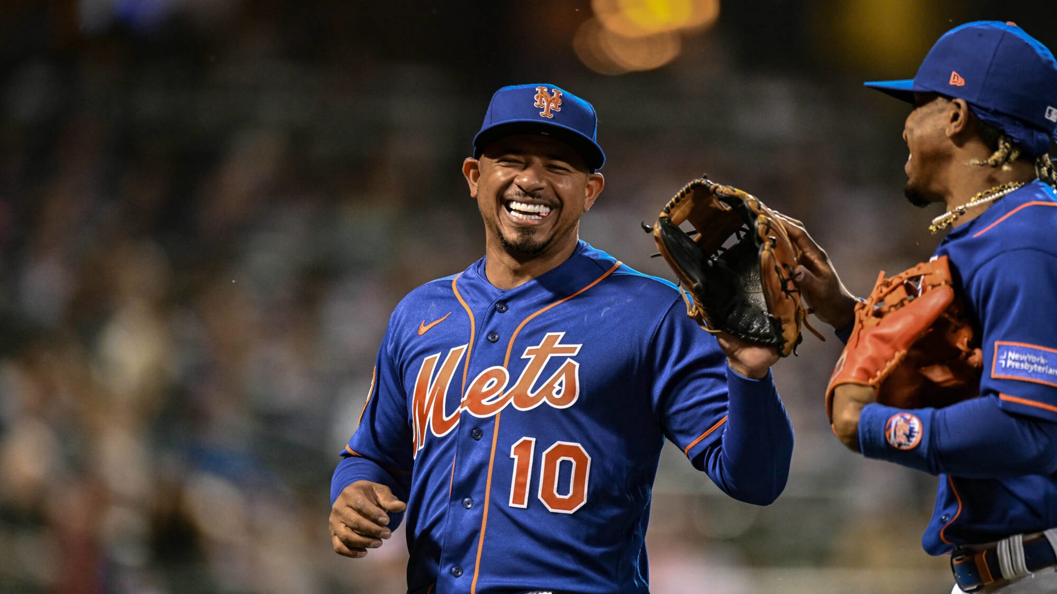 New York Mets Eduardo Escobar wears a New York Presbyterian