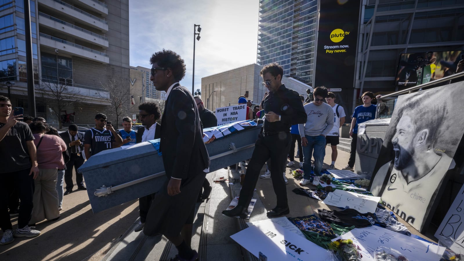 Angry Dallas fans protest around Dirk Nowitzki statue over Luka Doncic trade