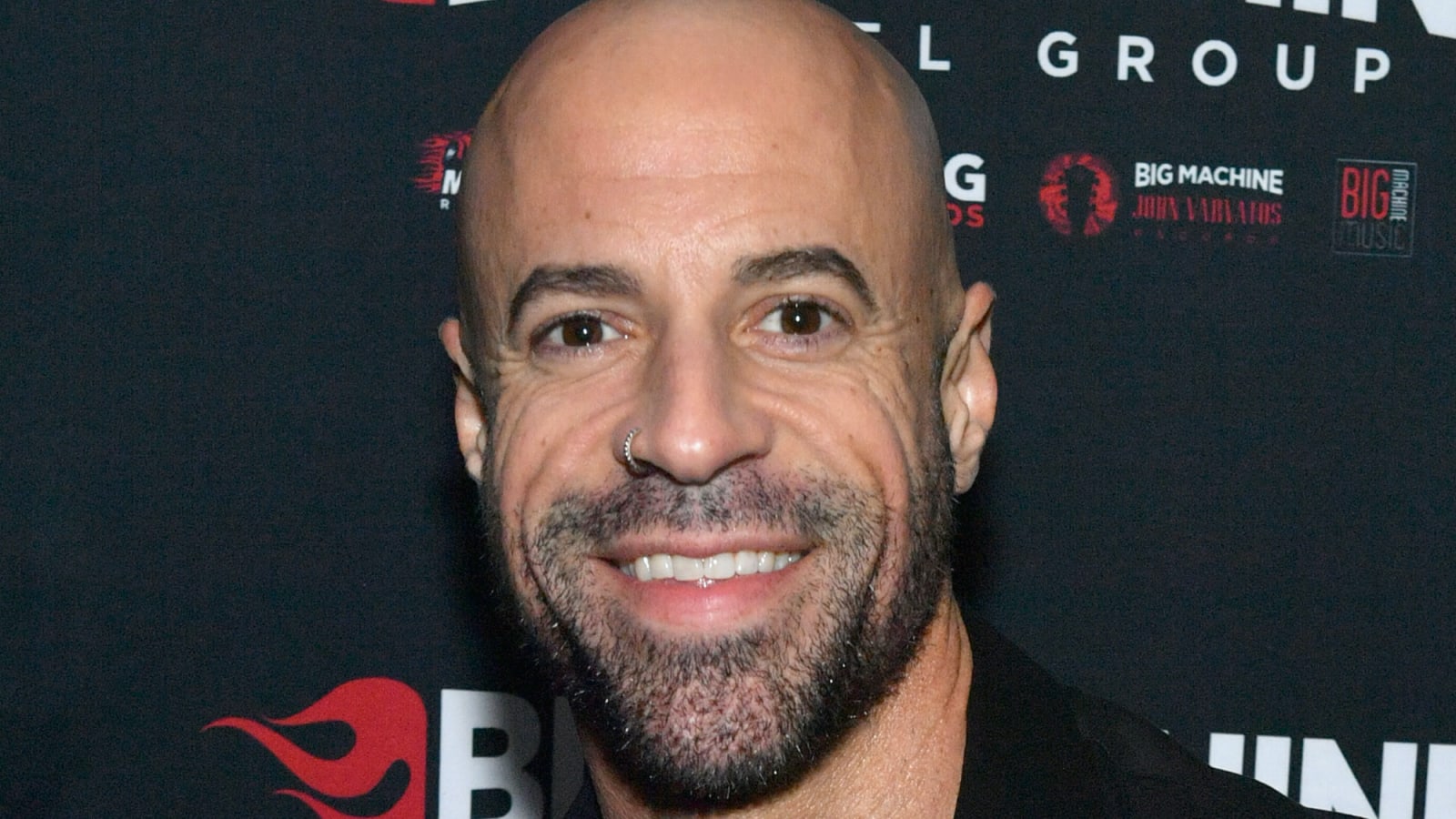Chris Daughtry Says His Shocking Blacked Out Arm Tattoos Are Not Meant to &#39;Turn You On&#39;