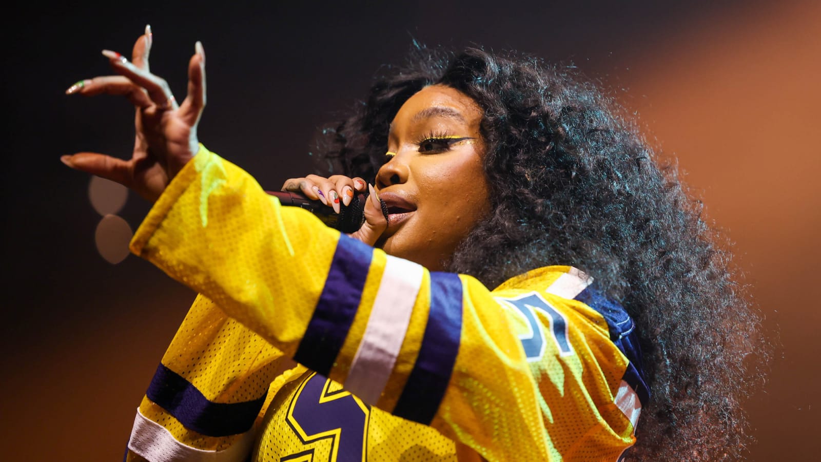 Watch SZA sing a song to Elmo on 'Sesame Street'