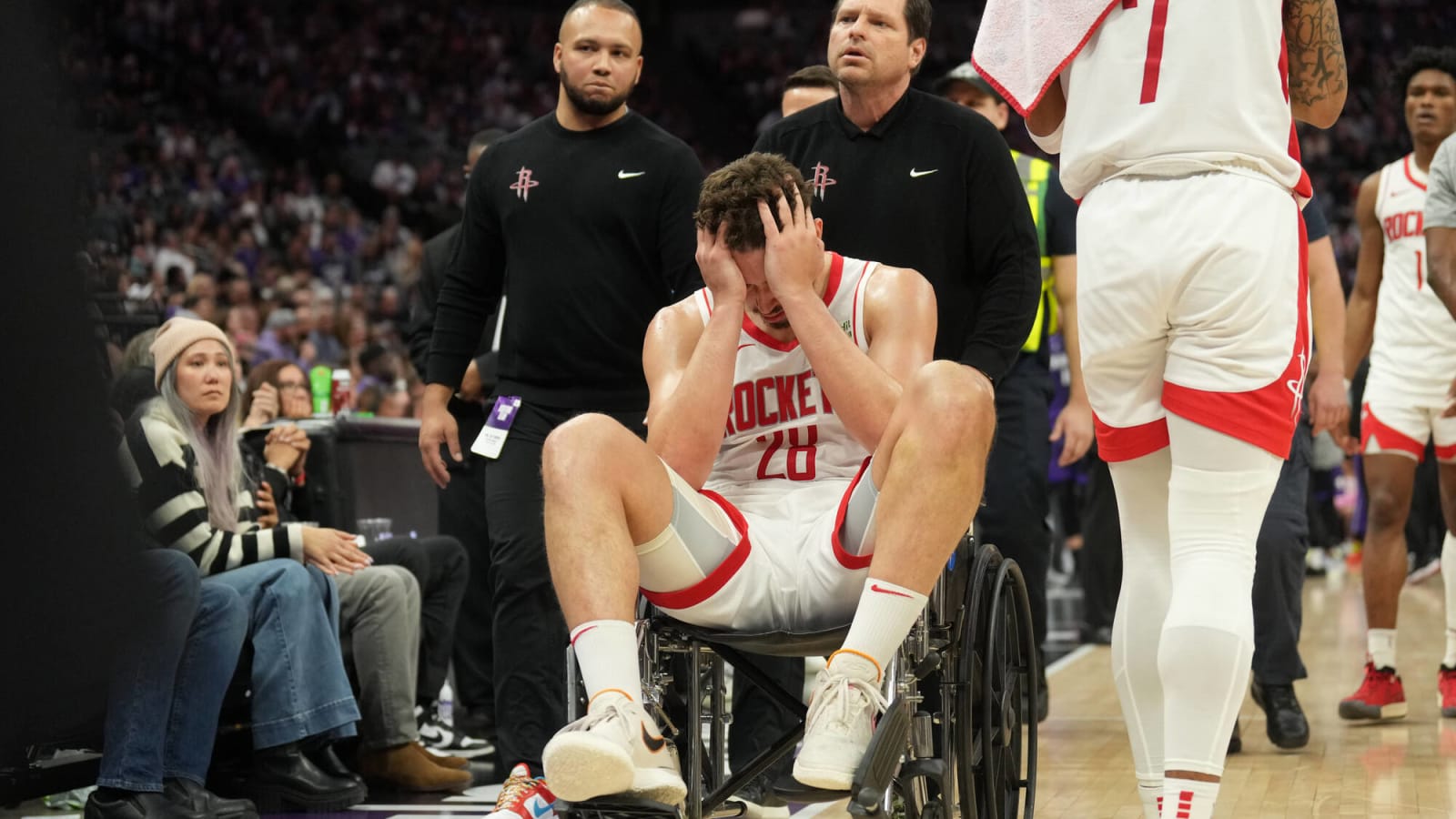 Watch: Rockets star Alperen Sengun escorted out in wheelchair after devastating fall against Sacramento Kings