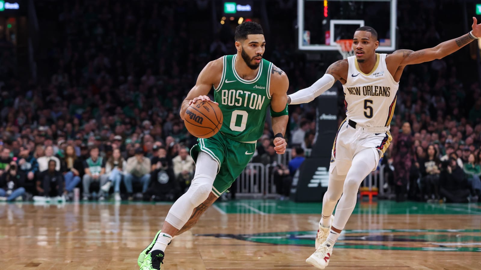 Jayson Tatum drives against the Pelicans at TD Garden