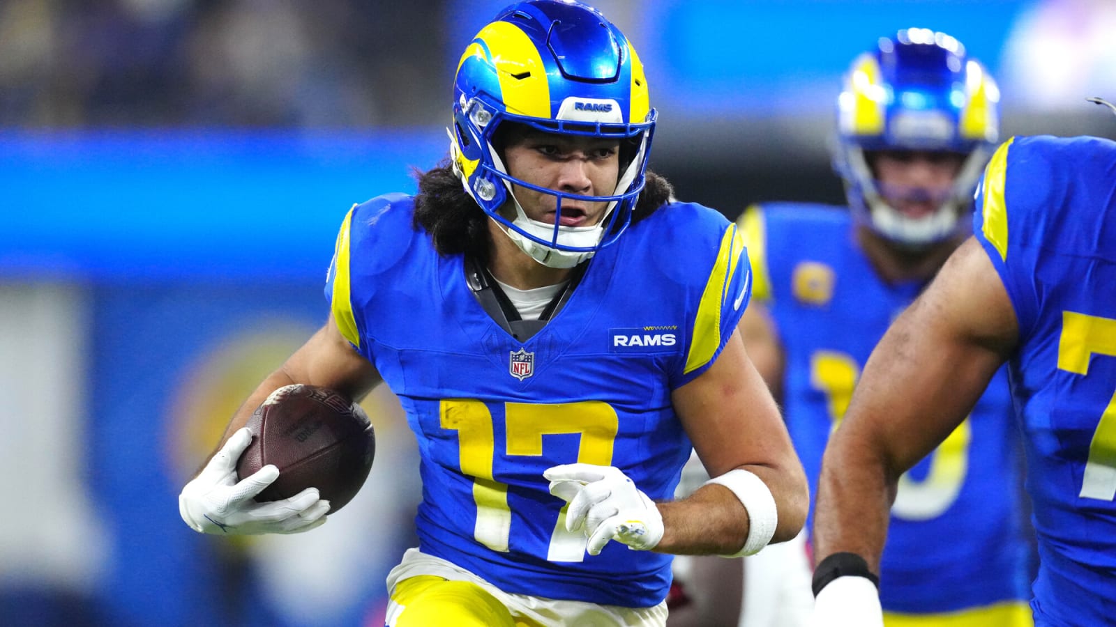 Puka Nacua carries the ball against Cardinals at SoFi Stadium