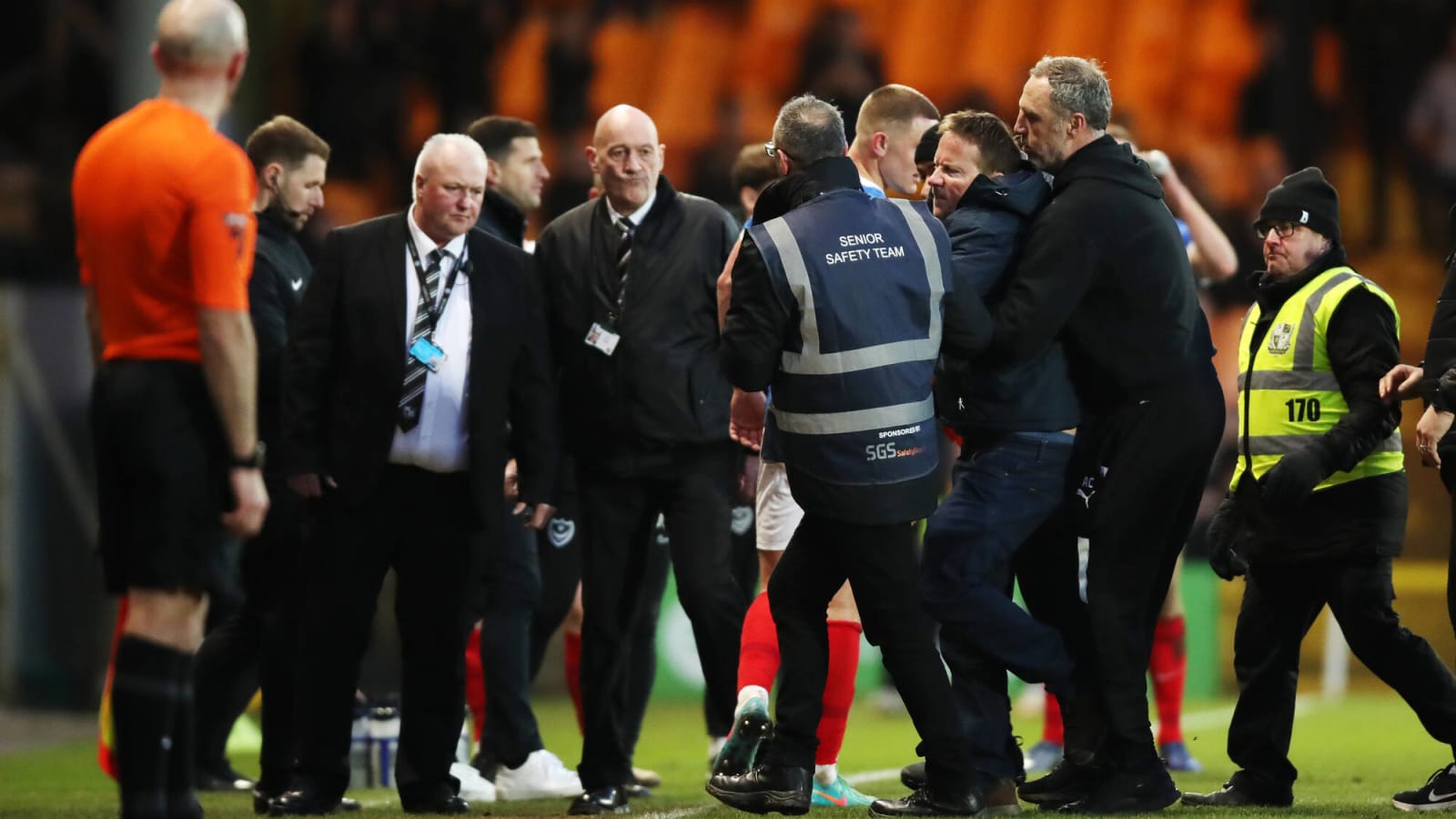 Watch: Crazy scenes in League One as Port Vale fan chases referee around pitch after late decision